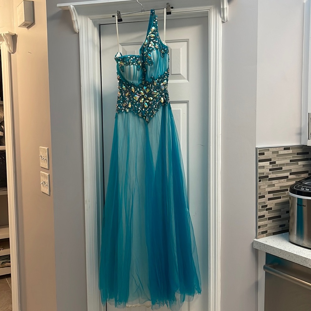 Blue, rhinestone one-shoulder gown